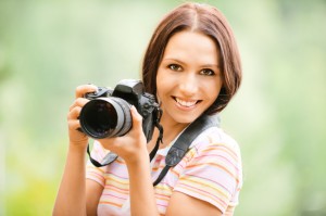 Beautiful girl with camera